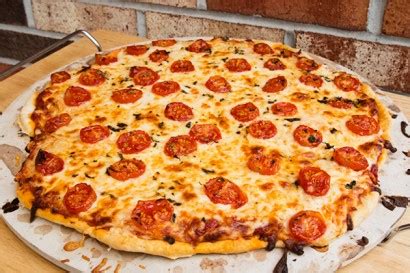 roasted-tomato-garlic-white-pizza-tasty-kitchen-a image