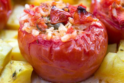 vegan-stuffed-tomatoes-with-rice-and-vegetables image