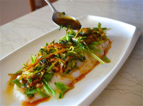 cantonese-style-steamed-fish-with-ginger-and-scallion image