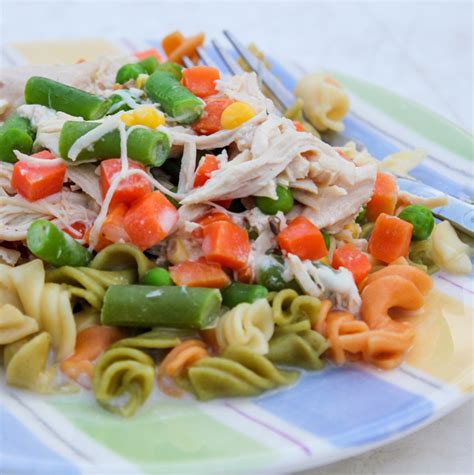 slow-cooker-garlic-chicken-and-veggie-alfredo-pasta image