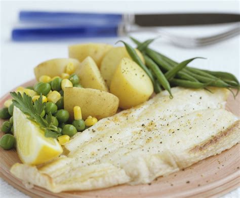 baked-lemon-catfish-in-foil-recipe-the-spruce-eats image
