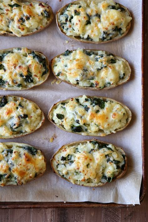 spinach-and-cheddar-twice-baked-potatoes image
