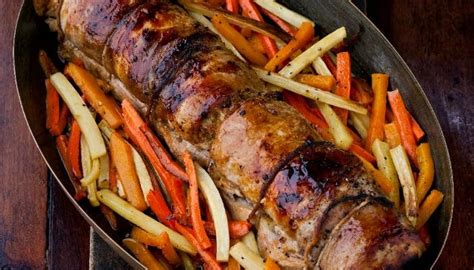 apple-and-chestnut-stuffed-pork-loin-with-cider-sauce image
