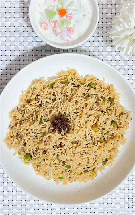 peas-pulao-with-kachumar-raita-healthier-steps image