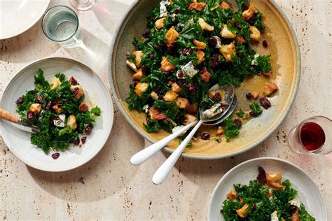 kale-salad-with-cranberries-pecans-and-blue-cheese image