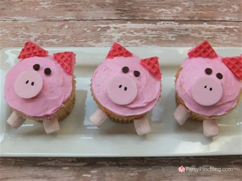 cute-pig-cupcakes-easy-to-make-with-pink-wafer image