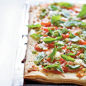 phyllo-pizza-with-feta-basil-and-tomatoes-tasty image