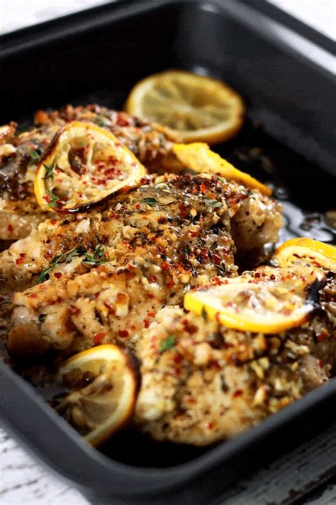 baked-stuffed-chicken-breast-with-lemon-garlic-spices image