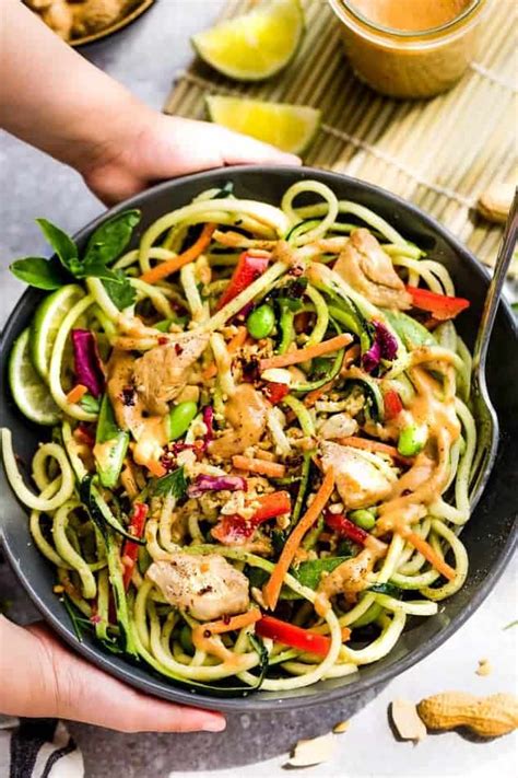 asian-zucchini-noodle-salad-with-thai-peanut-dressing image