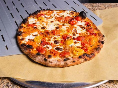 outdoor-pizza-oven-burst-cherry-tomato image