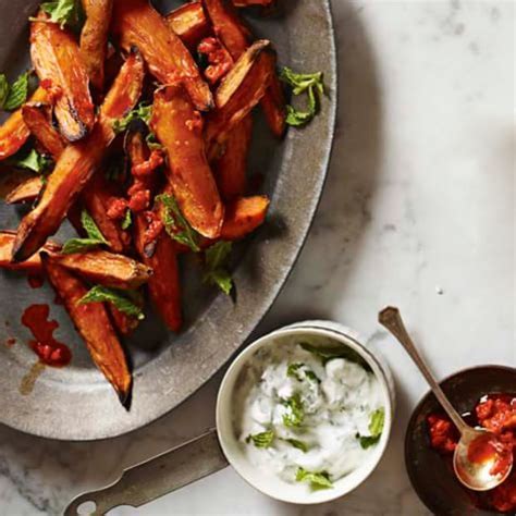 roasted-sweet-potatoes-with-chiles-and-herbed-yogurt image