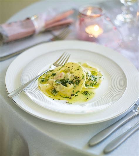 hot-smoked-salmon-ravioli-with-dill-butter-sauce image