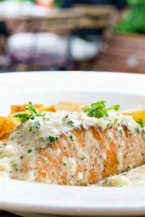 poached-salmon-with-dill-sauce-ina-garten-table image