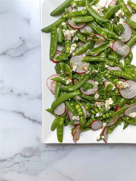 sugar-snap-pea-salad-with-radishes-mint-and-ricotta image
