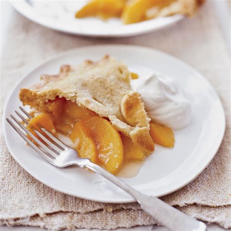 georgia-peach-pie-recipe-with-bourbon-whipped-cream image