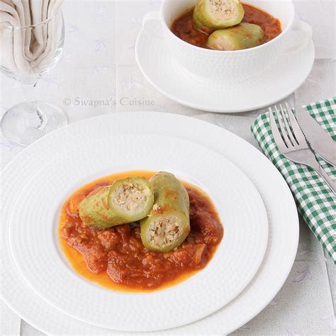 arabic-stuffed-zucchini-in-tomato-sauce-kousa image