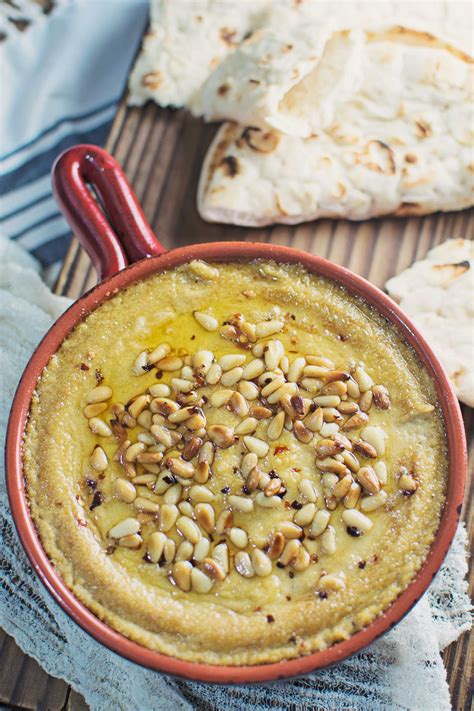 baked-hummus-with-toasted-pine-nuts-little-figgy-food image