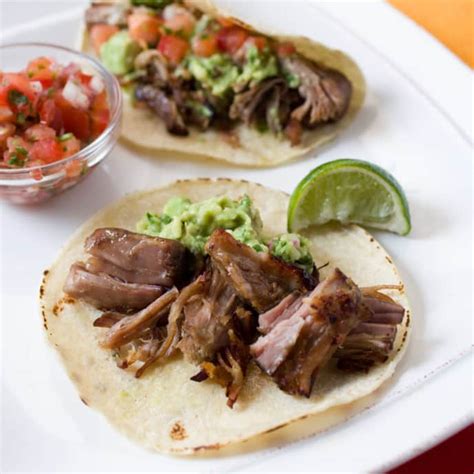 mexican-pulled-pork-carnitas-americas-test-kitchen image