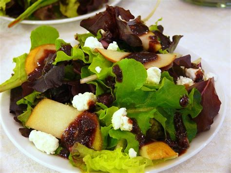 mixed-green-salad-with-pears-goat-cheese-and-a-fig image