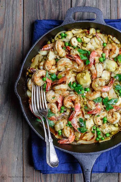 lemon-garlic-shrimp-recipe-with-peas-and-artichokes image