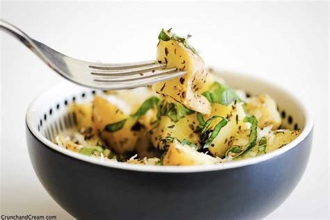 cheesy-garlic-herb-microwave-potatoes-crunch image
