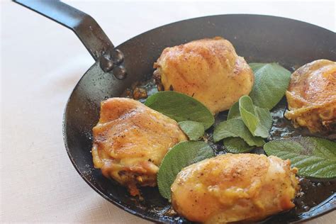 sage-roasted-chicken-thighs-syrup-and-biscuits image