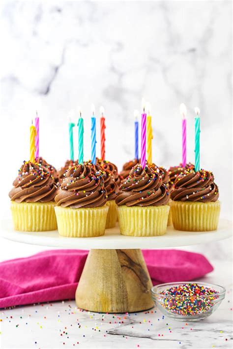yellow-cupcakes-with-chocolate-frosting-the-best image