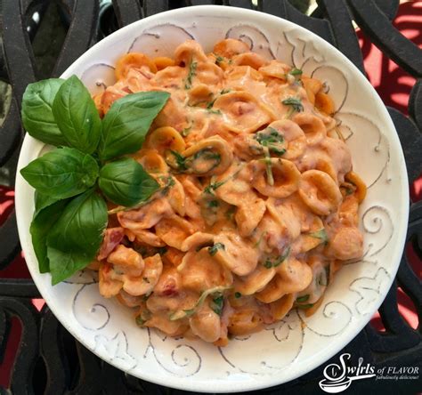 one-pot-creamy-tomato-basil-pasta-swirls-of-flavor image