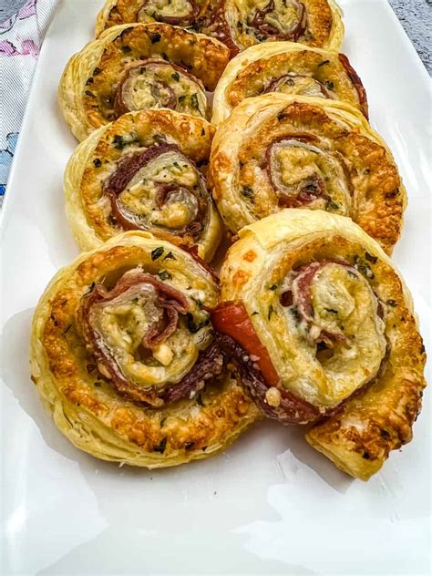 prosciutto-parmesan-puff-pastry-pinwheels-cook image