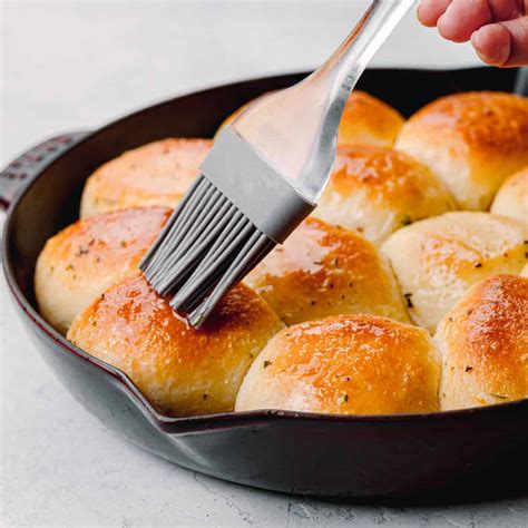 easy-dinner-rolls-with-herb-butter-posh-journal image