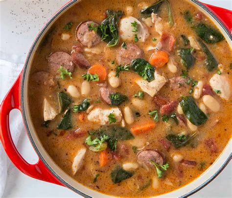 chicken-and-sausage-stew-with-white-beans-and-spinach image