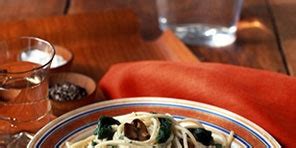 cremini-mushroom-pasta-with-wilted-arugula-and-goat image