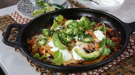easy-rotisserie-chicken-enchiladas-with-garlic-sour-cream image