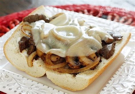 steak-and-cheese-sandwiches-with-onions-and-mushrooms image