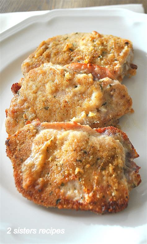 baked-stuffed-pork-chops-with-prosciutto-and-cheese image