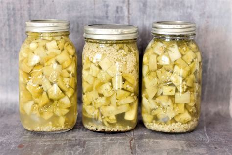 easy-pickled-green-tomatoes-recipe-dilly-garlic-flavor image