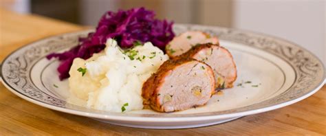 garlic-stuffed-roasted-pork-tenderloin-the-cozy-apron image