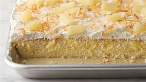 pia-colada-poke-sheet-cake-recipe-tablespooncom image