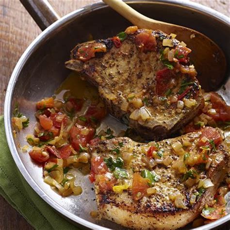 smothered-pork-chops-with-citrus-parsley-chatelaine image