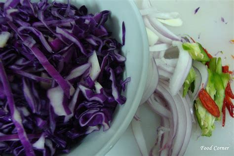 purple-cabbage-salad-garnishing-it-with-halloween image