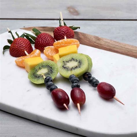 rainbow-fruit-skewers-eatingwell image