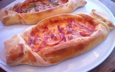 boat-shaped-greek-pizza-recipe-peinirli-or-peynirli image