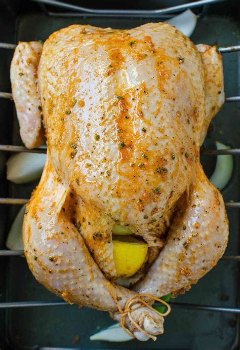 super-juicy-garlic-and-herb-roasted-whole-chicken image