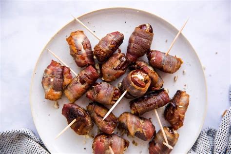 bacon-wrapped-dates-with-pecans-and-goat-cheese image
