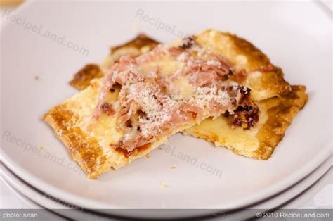 fontina-prosciutto-and-sun-dried-tomato-tart image