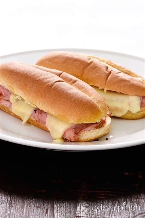 hot-ham-and-cheese-sandwiches-recipe-add-a-pinch image