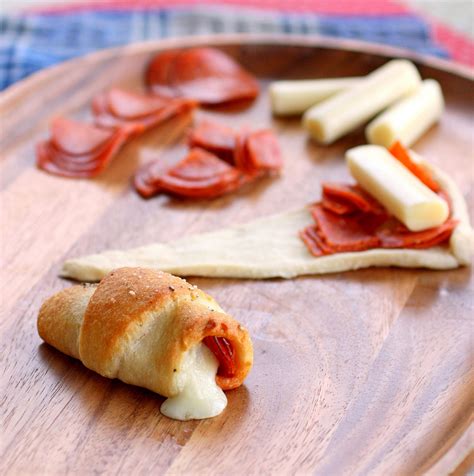 pepperoni-cheese-stick-roll-ups-video-the-girl image