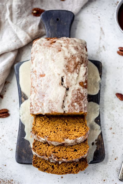 healthy-pumpkin-bread-with-maple-glaze-ambitious image