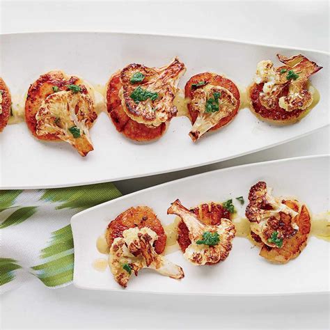 seared-scallops-with-caper-raisin-sauce-food-wine image