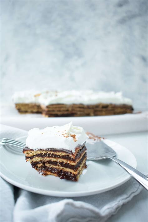 chocolate-graham-cracker-icebox-cake-bite-your-cravings image